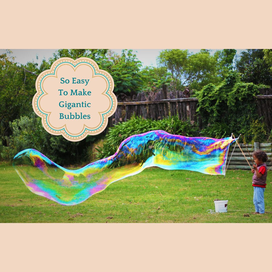 Child playing with giant bubbles in a backyard setting with overlay: So Easy To Make Gigantic Bubbles