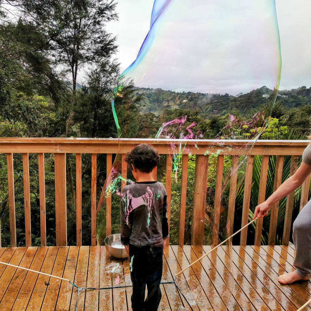 People in a Bubble Wand