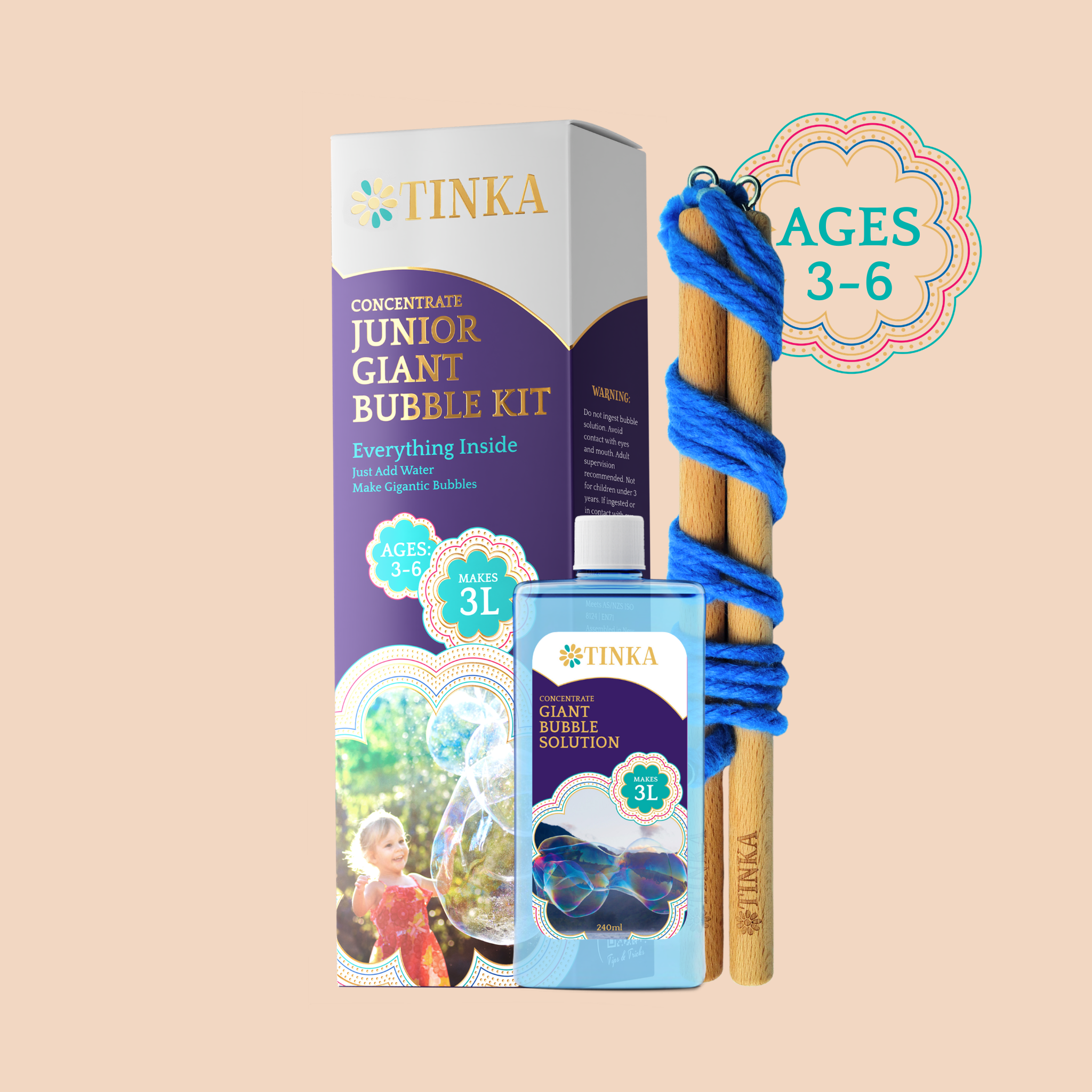 A purple and gold box by Tinka with a blue bottle of 240ml of bubble liquid and a blue bubble wand on a plain background.
